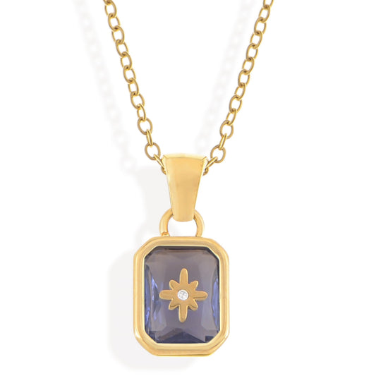 Gold Tone Pendant Necklace with Rectangular Crystal and Starburst Accent