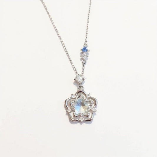 Women's Star Flower Pendant Necklace with Crystal Center Stone and Accent Gem Detailing