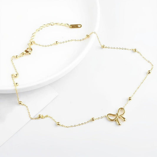 Women's Bow Pendant Necklace with Dainty Beaded Chain Design