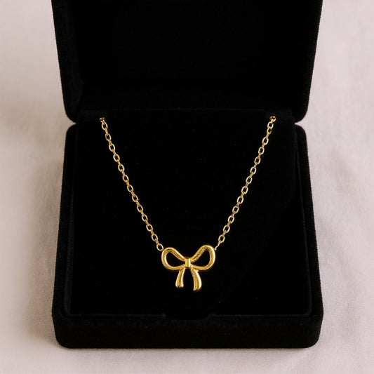 Women's Bow Pendant Necklace with Polished Metal Finish and Minimalist Chain Design for Everyday Feminine Style