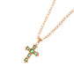Gold Tone Cross Pendant Necklace with Green Gemstone Accents