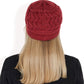 Knitted Newsboy Cap with Braided Cable Pattern and Stylish Brim Design