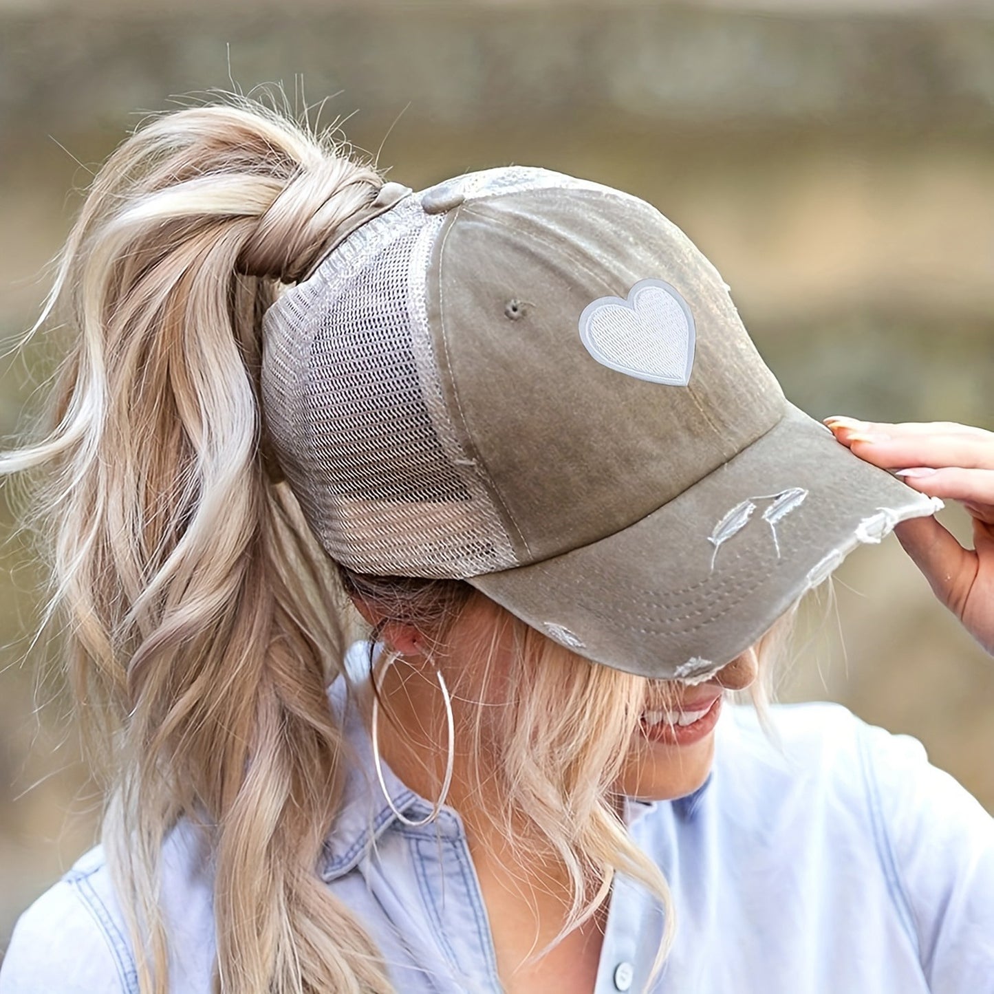 Distressed Trucker Hat with White Heart Patch