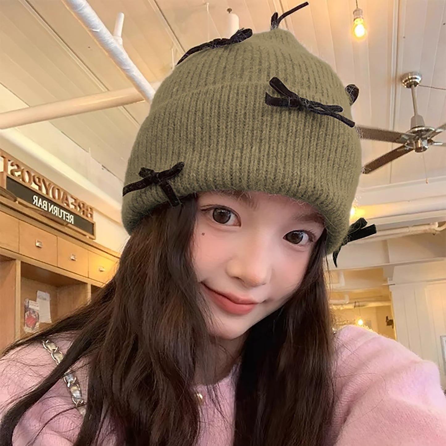 Knitted Beanie with Black Bow Accents - Cute & Stylish Winter Hat for Cold Weather