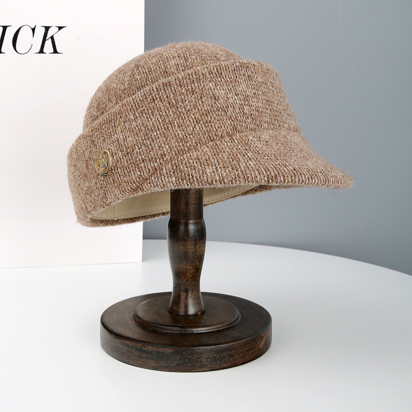 Knit Cloche Hat with Structured Brim and Decorative Metal Accent