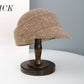 Knit Cloche Hat with Structured Brim and Decorative Metal Accent