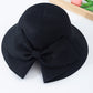 Wide Brim Straw Sun Hat with Oversized Bow Detail and Adjustable Inner Band