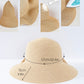 Wide Brim Straw Sun Hat with Oversized Bow Detail and Adjustable Inner Band