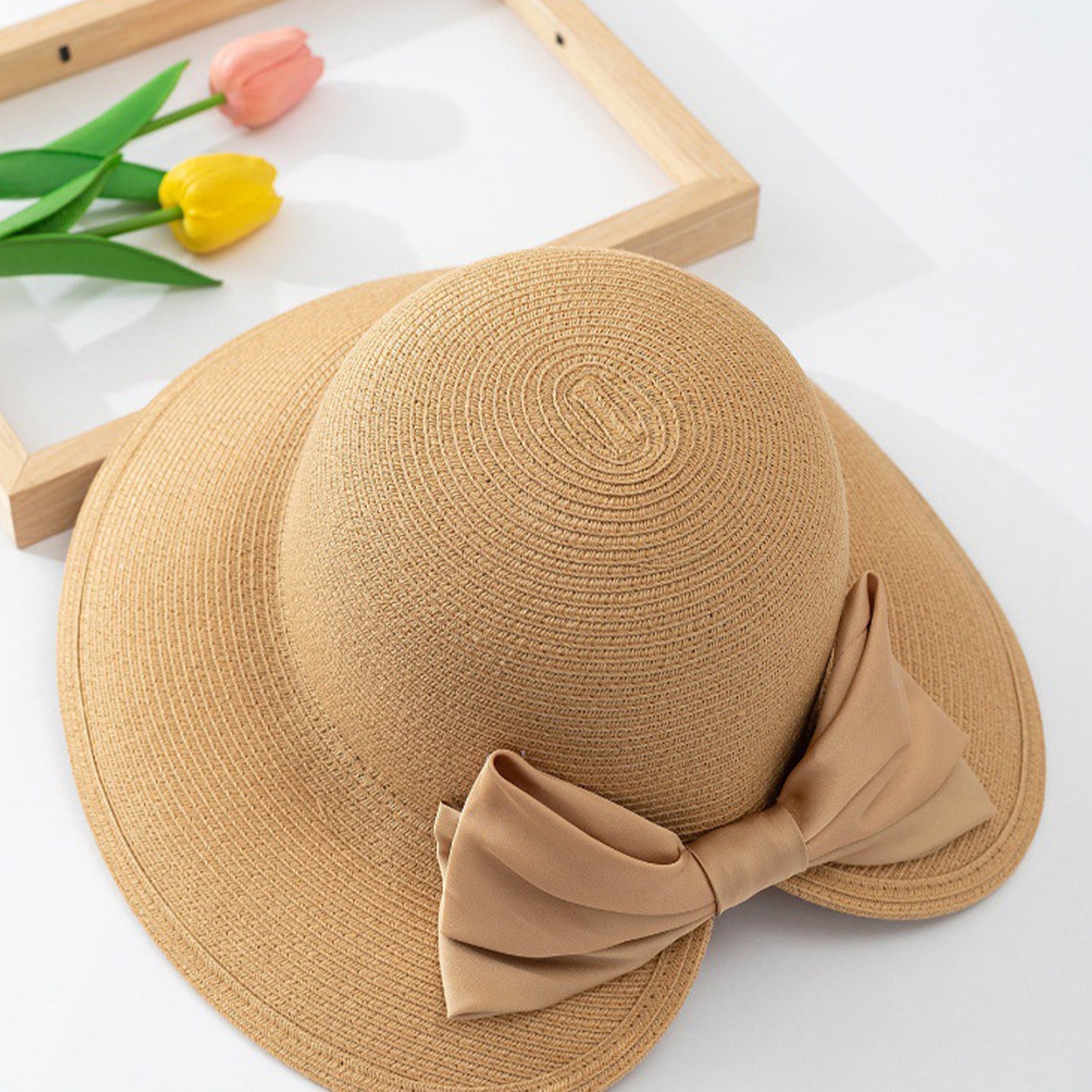 Elegant Straw Sun Hat with Soft Bow Detail