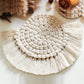 Woven Fiber Coaster with Fringe Detail for Tabletop Protection and Decorative Candle Display