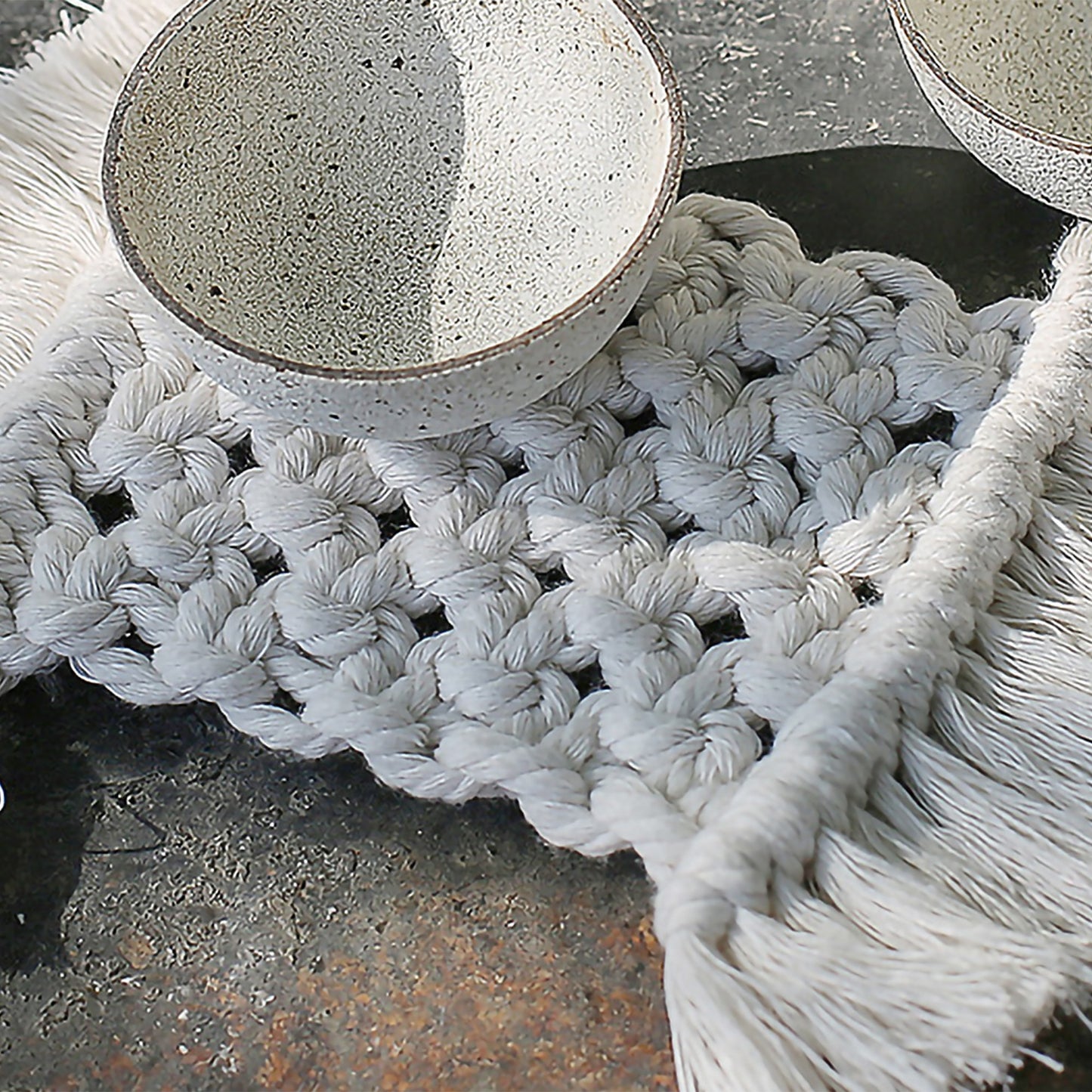 Woven Fiber Coaster with Fringe Detail for Tabletop Protection and Decorative Candle Display