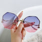 Women's Oversized Geometric Rimless Sunglasses with Gradient Lenses and Decorative Storage Case