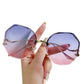 Women's Oversized Geometric Rimless Sunglasses with Gradient Lenses and Decorative Storage Case