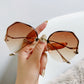 Women's Oversized Geometric Rimless Sunglasses with Gradient Lenses and Decorative Storage Case