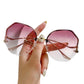 Women's Oversized Geometric Rimless Sunglasses with Gradient Lenses and Decorative Storage Case
