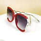 Women's Oversized Square Sunglasses with Cutout Chain Link Arms and Glamorous Metal Trim Detailing