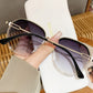 Women's Fashion Round Gradient Lens Sunglasses with Metal Arms and Transparent Frame Design for Modern Everyday Style