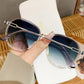 Women's Fashion Round Gradient Lens Sunglasses with Metal Arms and Transparent Frame Design for Modern Everyday Style