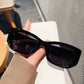 Women's Retro Thick Frame Cat Eye Sunglasses with Contrasting Arms and UV400 Protective Lenses for Bold Everyday Looks