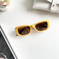 Women's Retro Thick Frame Cat Eye Sunglasses with Contrasting Arms and UV400 Protective Lenses for Bold Everyday Looks