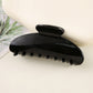 Curved Hair Claw Clip with Smooth Finish and Secure Hold