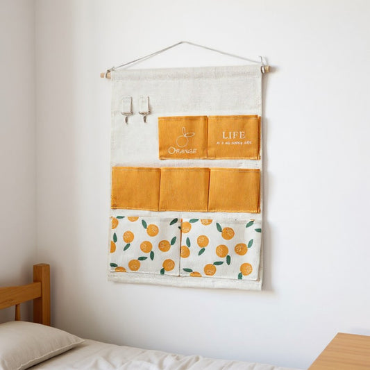 Hanging Wall Storage Organizer with Multiple Fabric Pockets and Orange Fruit Print Design