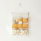Hanging Wall Storage Organizer with Multiple Fabric Pockets and Orange Fruit Print Design