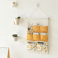 Hanging Wall Storage Organizer with Multiple Fabric Pockets and Orange Fruit Print Design