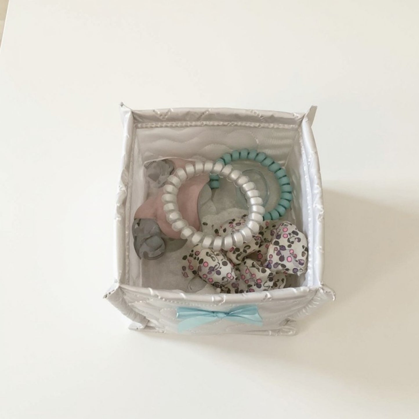 Quilted Storage Basket with Heart Stitching and Bow Accent