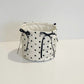 Quilted Polka Dot Storage Basket with Bow Accent and Soft Fabric Design