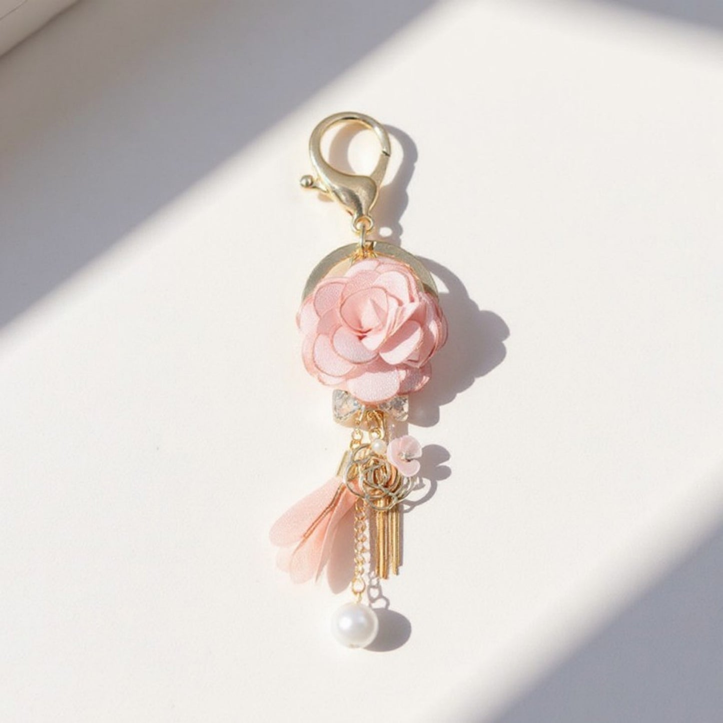 Pink Flower Tassel Keychain with Pearl Accent and Gold Metal Details
