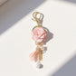 Pink Flower Tassel Keychain with Pearl Accent and Gold Metal Details