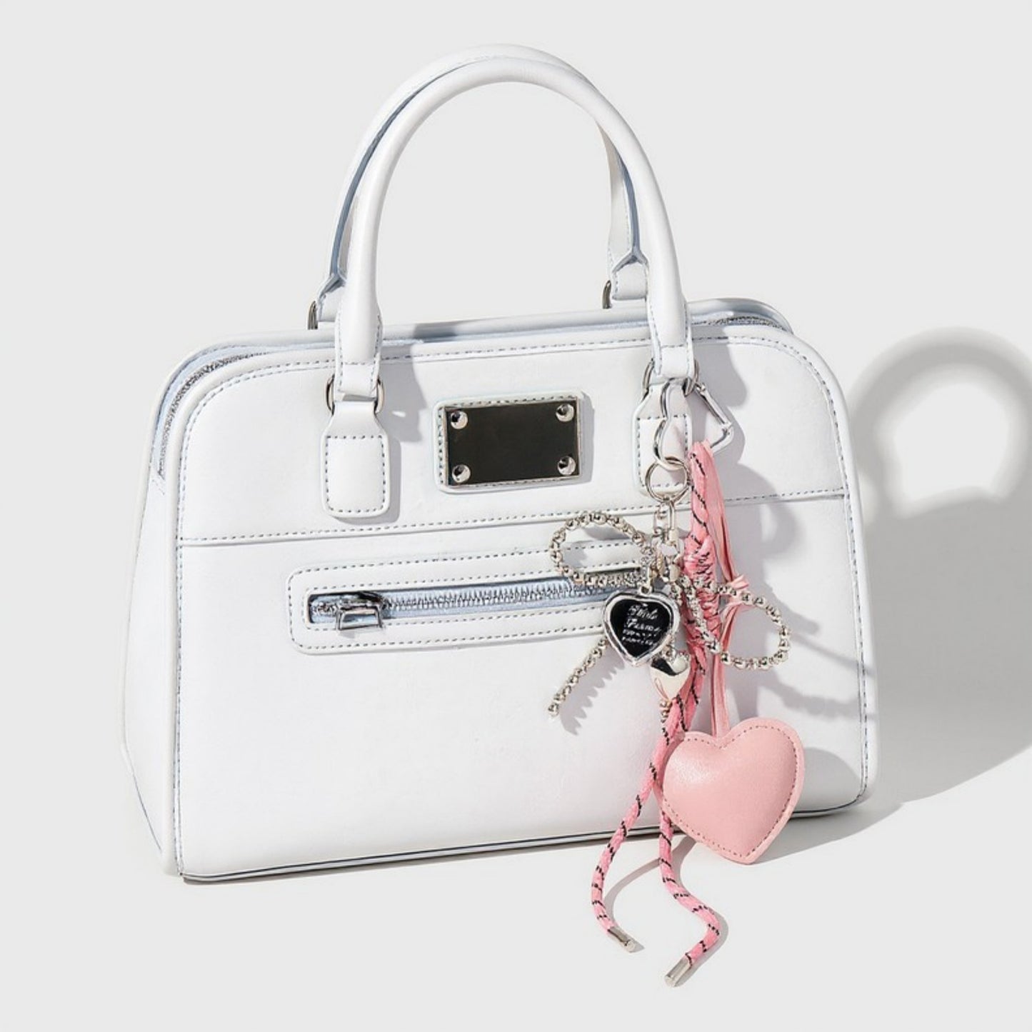 Heart Charm Keychain with Silver Chain Details and Bow Accent