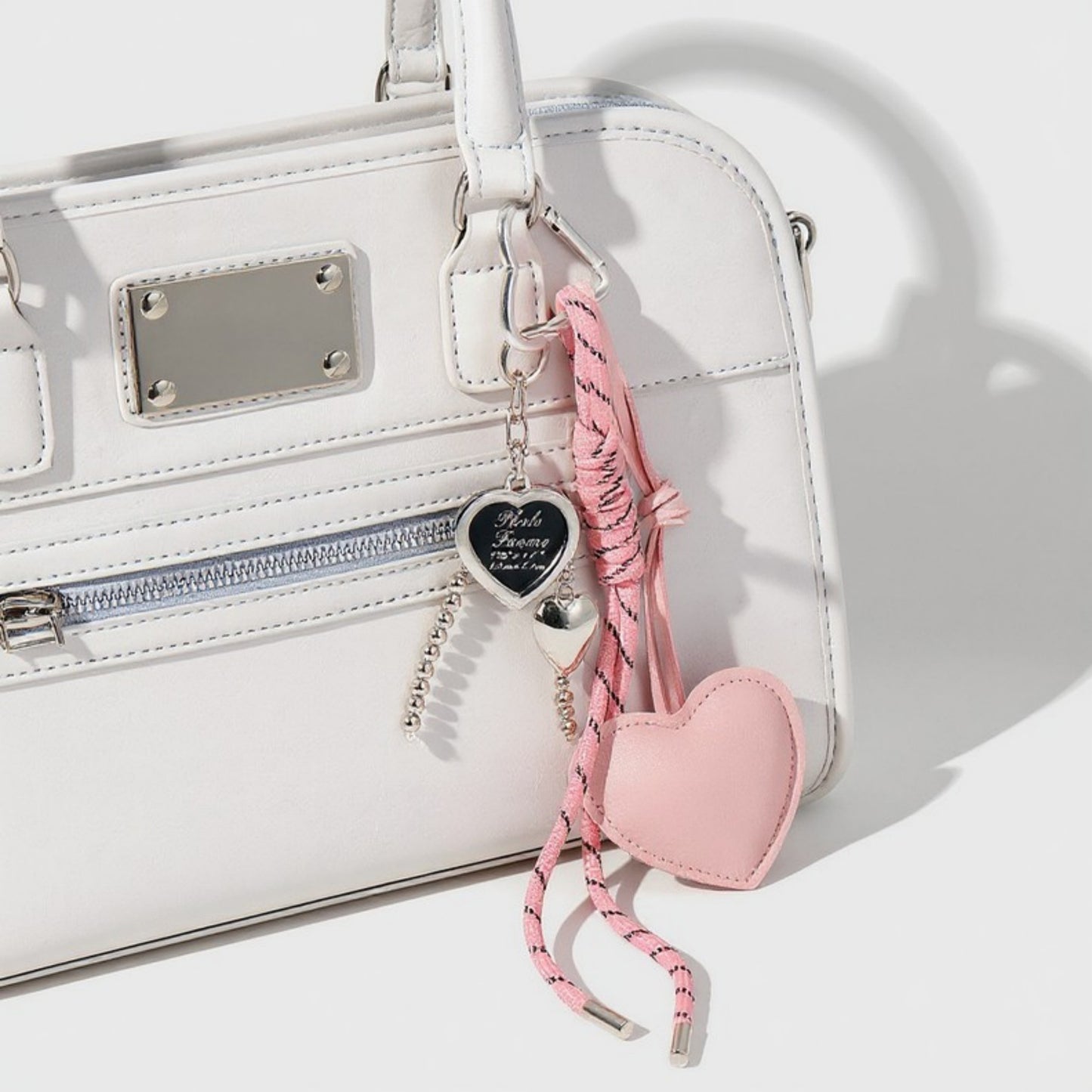 Heart Charm Keychain with Silver Chain Details and Bow Accent