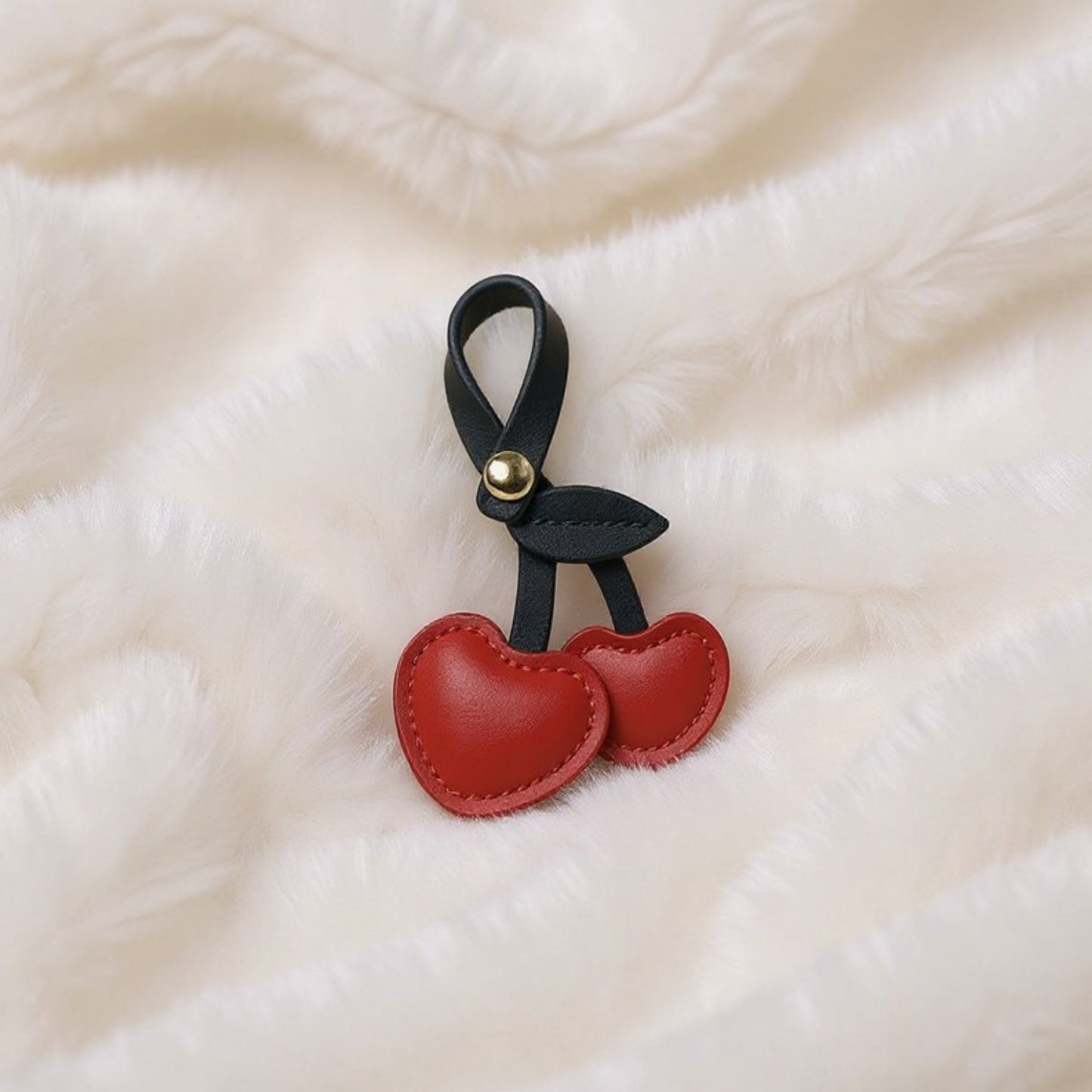 Faux Leather Cherry Heart Keychain with Black Leaf Strap and Gold Rivet Detail