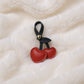 Faux Leather Cherry Heart Keychain with Black Leaf Strap and Gold Rivet Detail