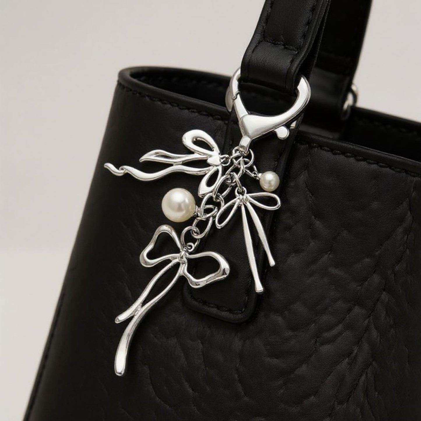 Silver Bow Keychain with Pearl Charms and Heart Clasp Accent