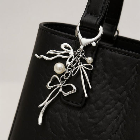 Silver Bow Keychain with Pearl Charms and Heart Clasp Accent
