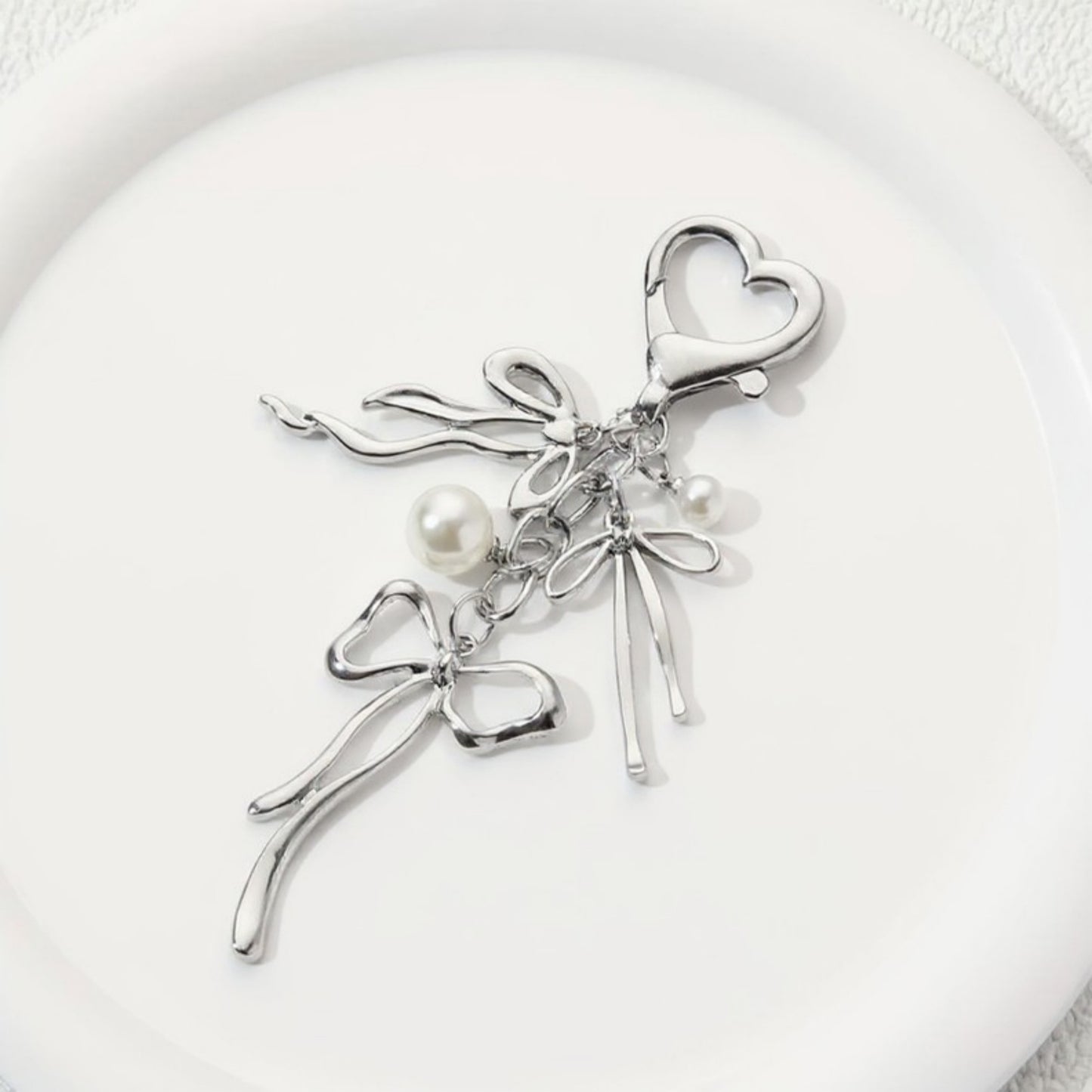 Silver Bow Keychain with Pearl Charms and Heart Clasp Accent