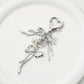 Silver Bow Keychain with Pearl Charms and Heart Clasp Accent