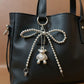 Metallic Beaded Bow Keychain with Crystal Bear Charm and Ring Accent
