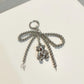 Metallic Beaded Bow Keychain with Crystal Bear Charm and Ring Accent