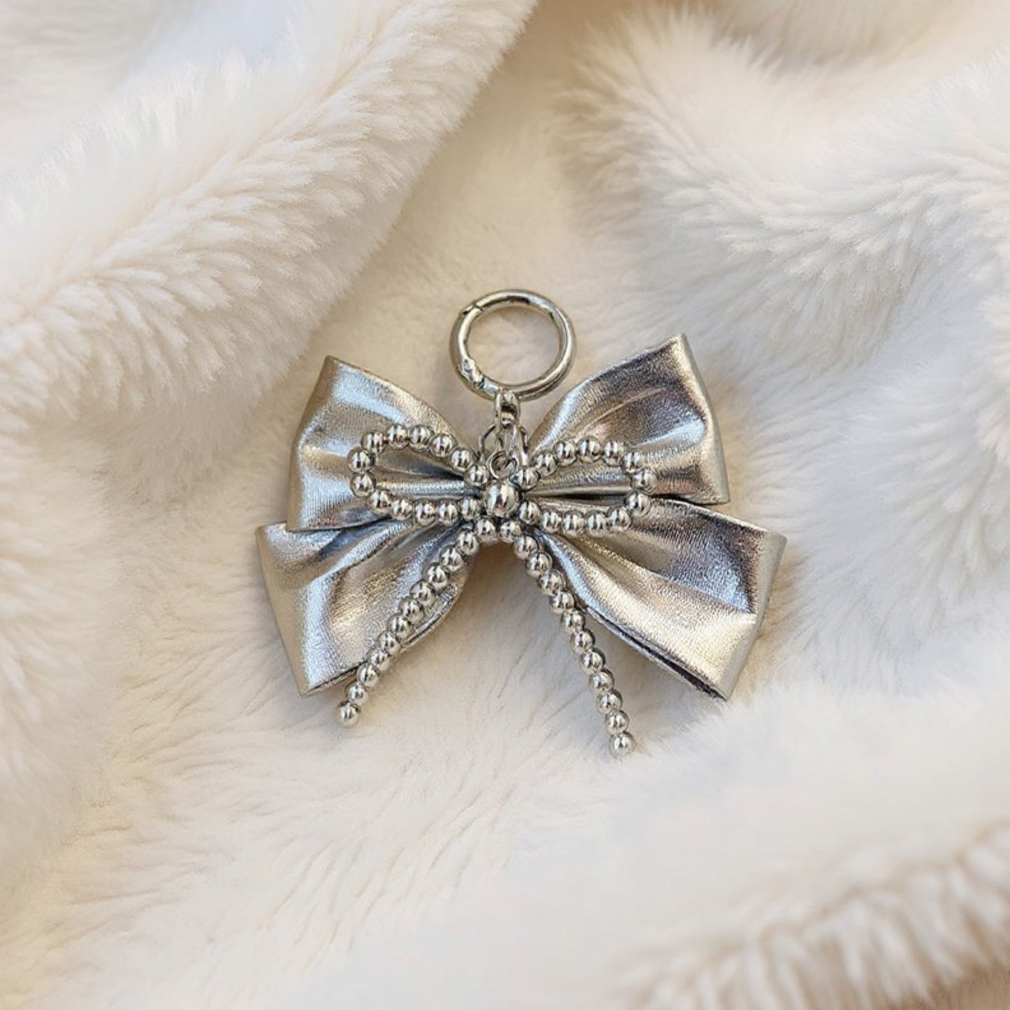 Metallic Bow Charm Keychain with Silver Beaded Detailing