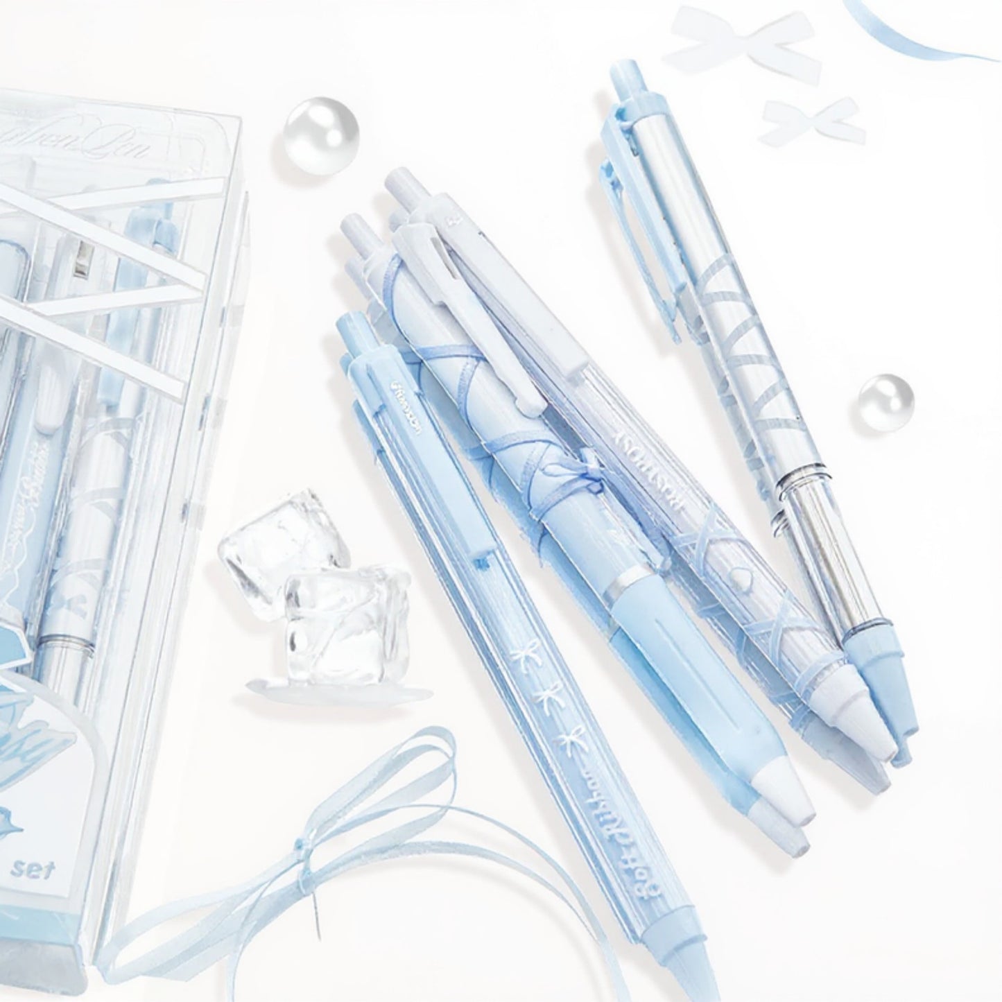 Set of 4 Retractable Ballpoint Pens with Light Blue Decorative Barrel Designs
