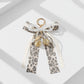Leopard Print Ribbon Keychain with Pearl Bow and Cherry Charms