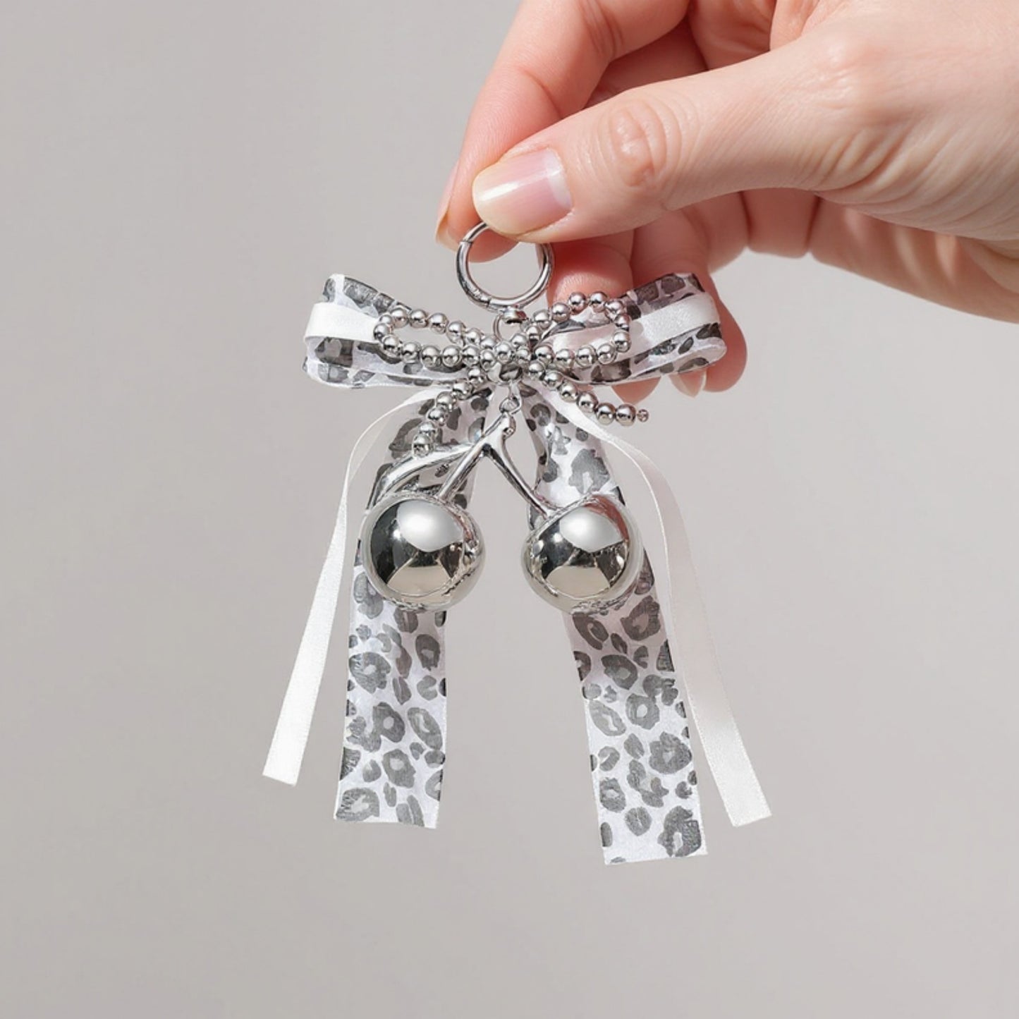 Leopard Print Ribbon Keychain with Pearl Bow and Cherry Charms