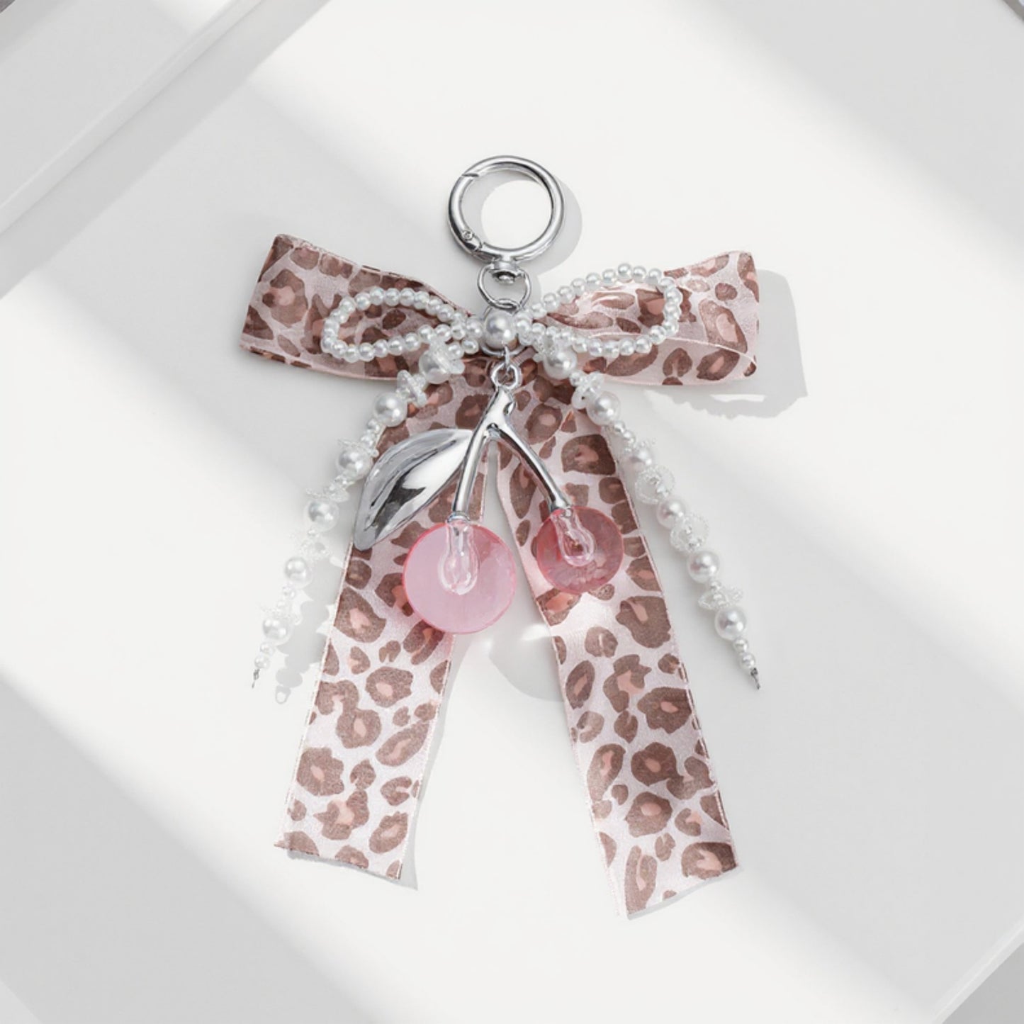 Leopard Print Ribbon Keychain with Pearl Bow and Cherry Charms