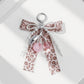Leopard Print Ribbon Keychain with Pearl Bow and Cherry Charms