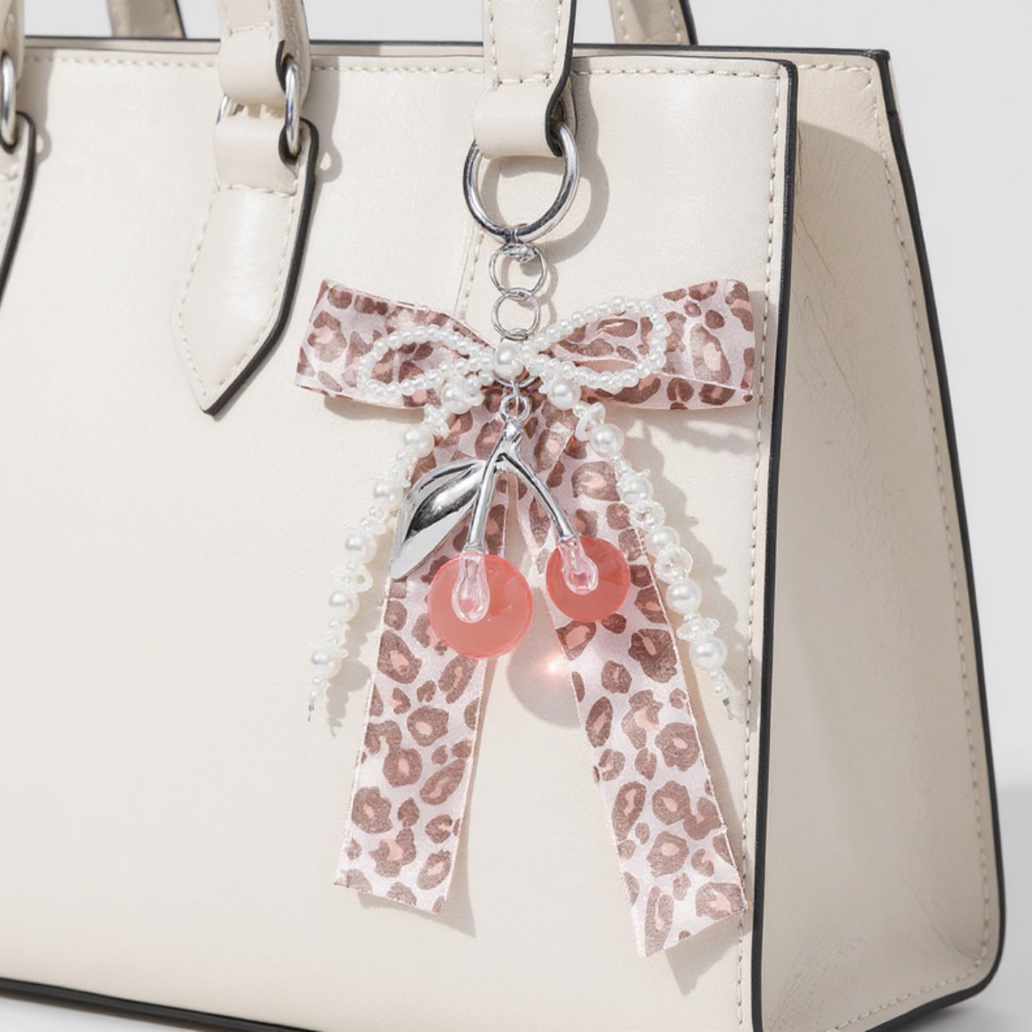 Leopard Print Ribbon Keychain with Pearl Bow and Cherry Charms