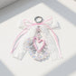 Blue Ribbon Keychain with Pearl Bow and Iridescent Beaded Star Charms